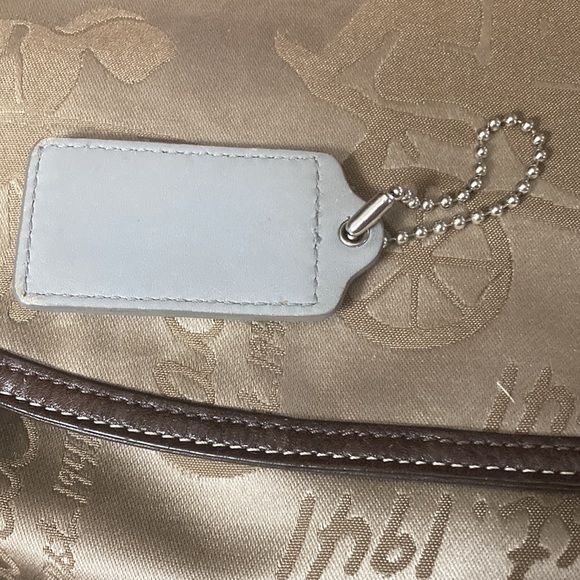 Coach hangtag silver/grey with a perforated leather front and smooth back. - Picture 3 of 3